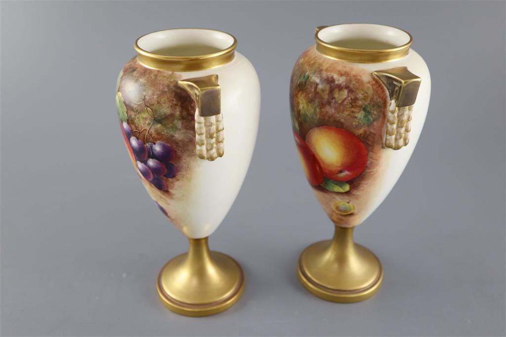 A pair of Royal Worcester fruit painted oviform vases, post-war, painted by J. Cook & P. Lynes, 21cm high